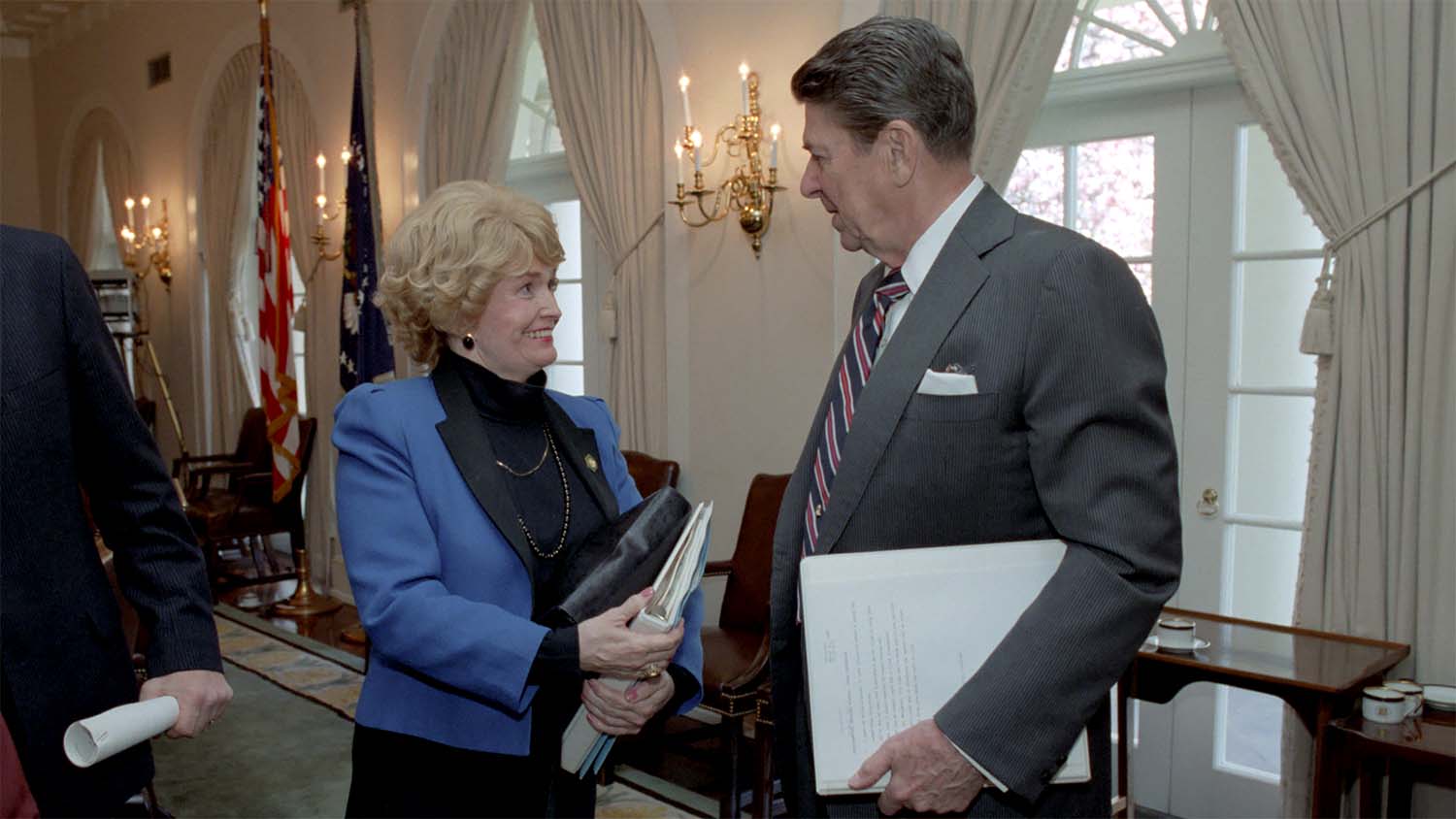 Health and Human Services Secretary Margaret Heckler speaking with President Ronald Reagan at the White House in March 1985